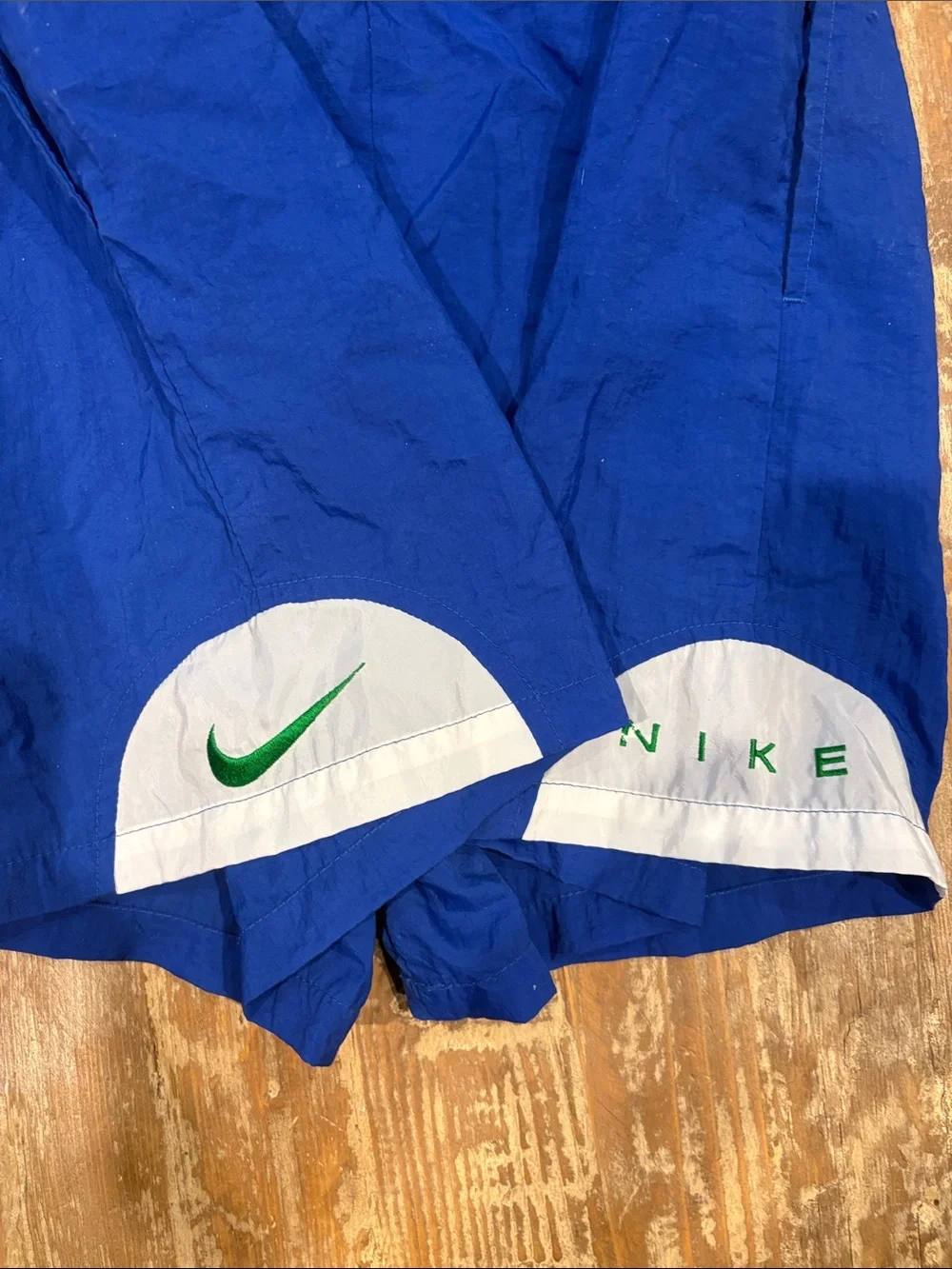Nike Blue Athletic Shorts with White & Green Accents